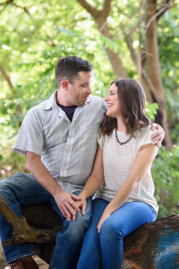 A Bride to be looks at her fiance with love in their penn treaty park engagement session.